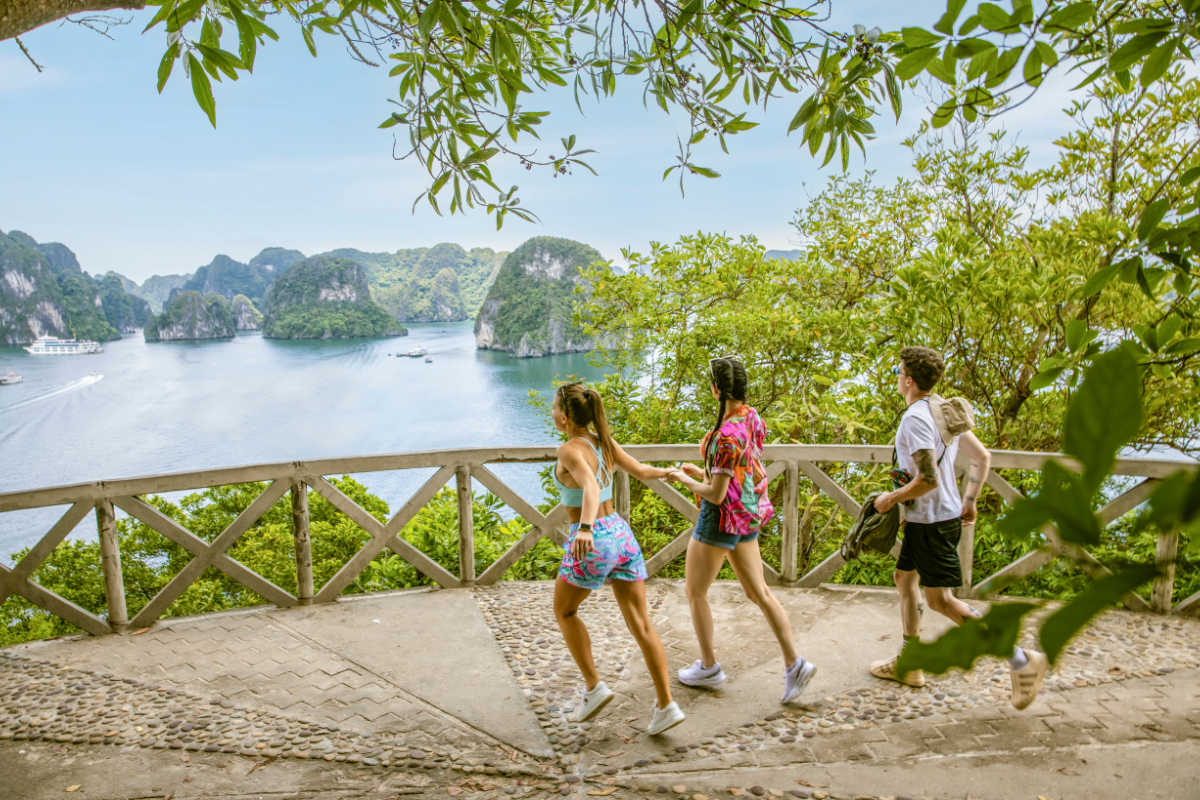 View of Ti Top Beach with limestone islands in Ha Long Bay